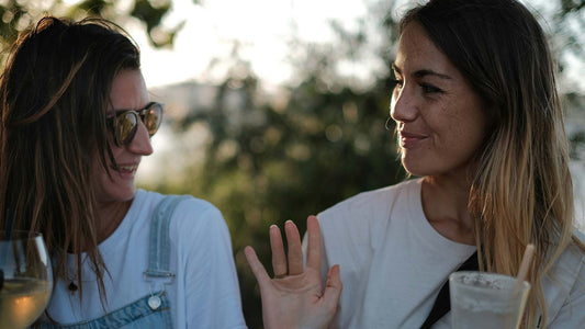 two women conversing and hanging out