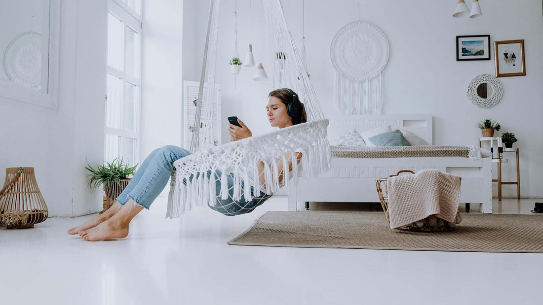 Woman relaxing in a hammock