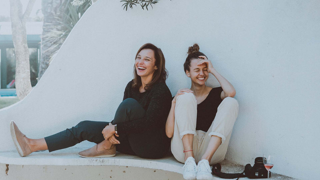 Two friends laughing