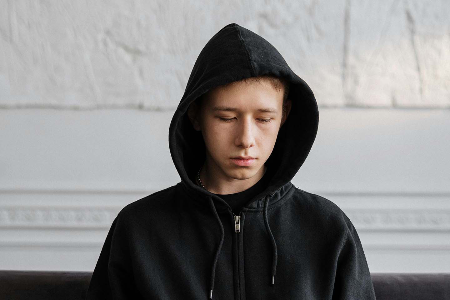 unhappy looking teen